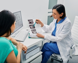 Doctor explaining pregnancy and women's health treatment during consultation at Doctor Gowri's Balaji Hospital, Tirupati.